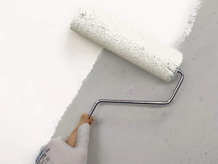 Applying insulating paint with a roller