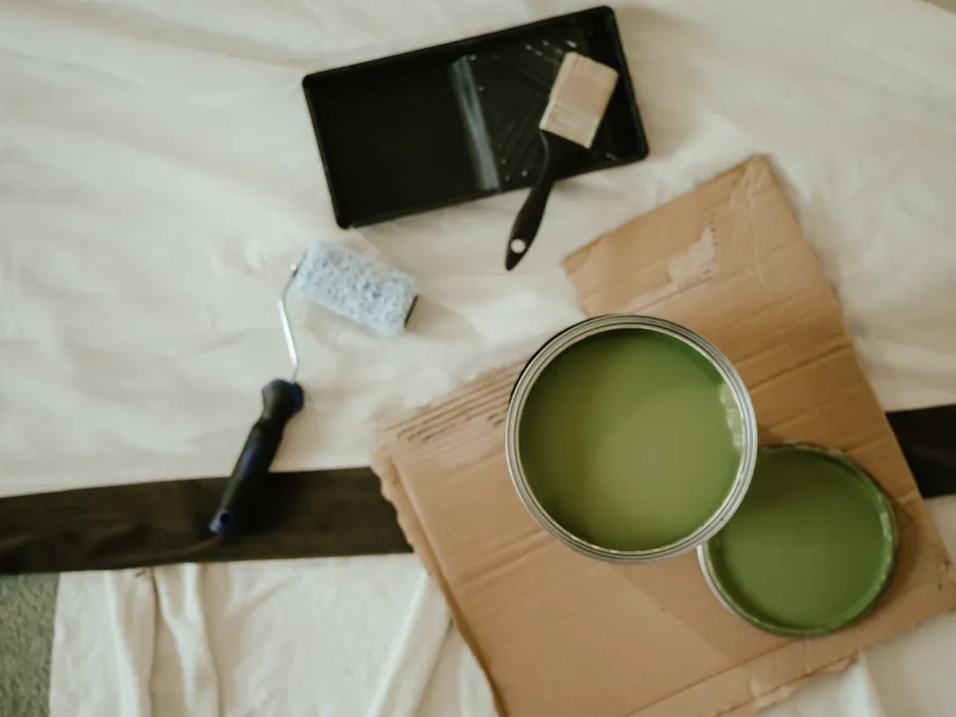 Tin of green paint