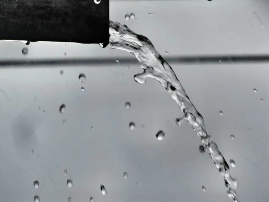 Water flowing from a pipe